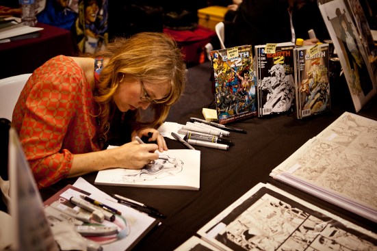 Nicola Scott working a commission.